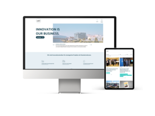Screen MockUp der Business Upper Austria Website am iMac und iPad 